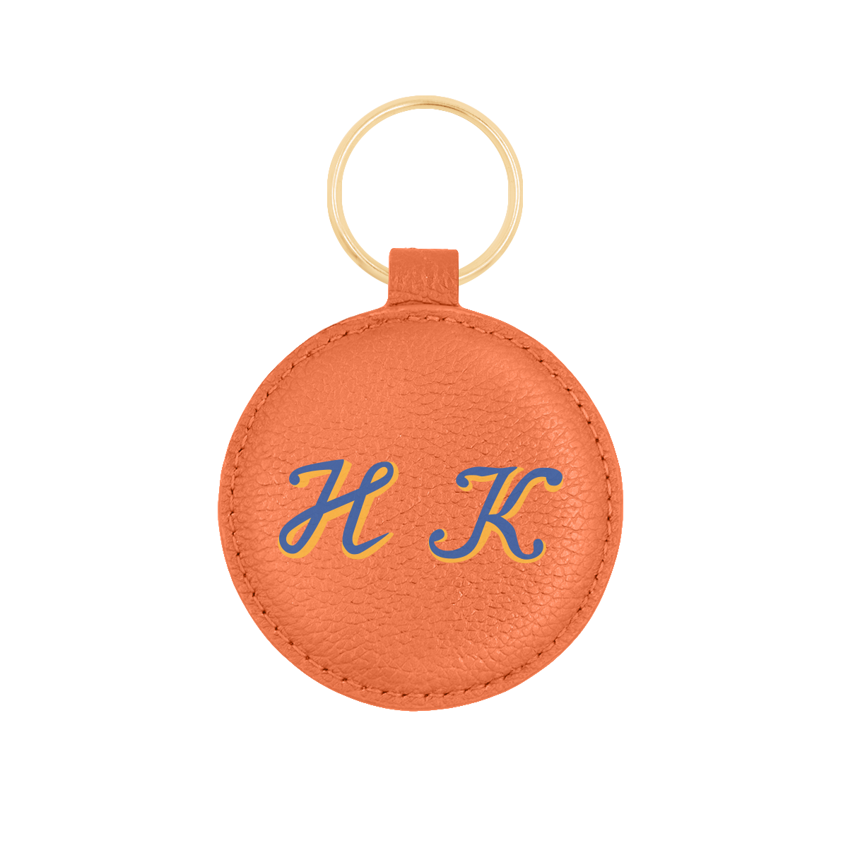 Brelok w kształcie medalika w kolorze pomarańczowym pozłacany